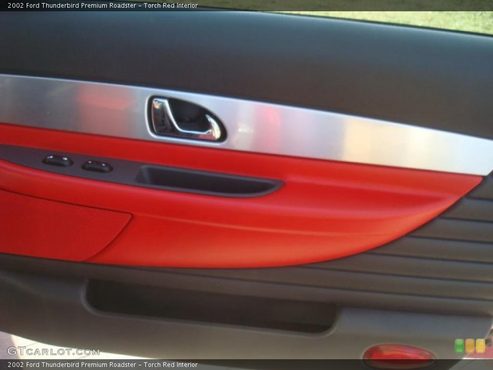 Torch Red Interior Door Panel for the 2002 Ford Thunderbird Premium Roadster #45466478