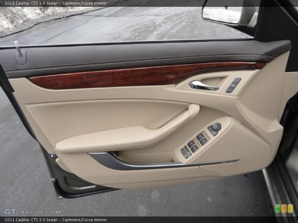 Cashmere/Cocoa Interior Door Panel for the 2011 Cadillac CTS 3.0 Sedan #45476574