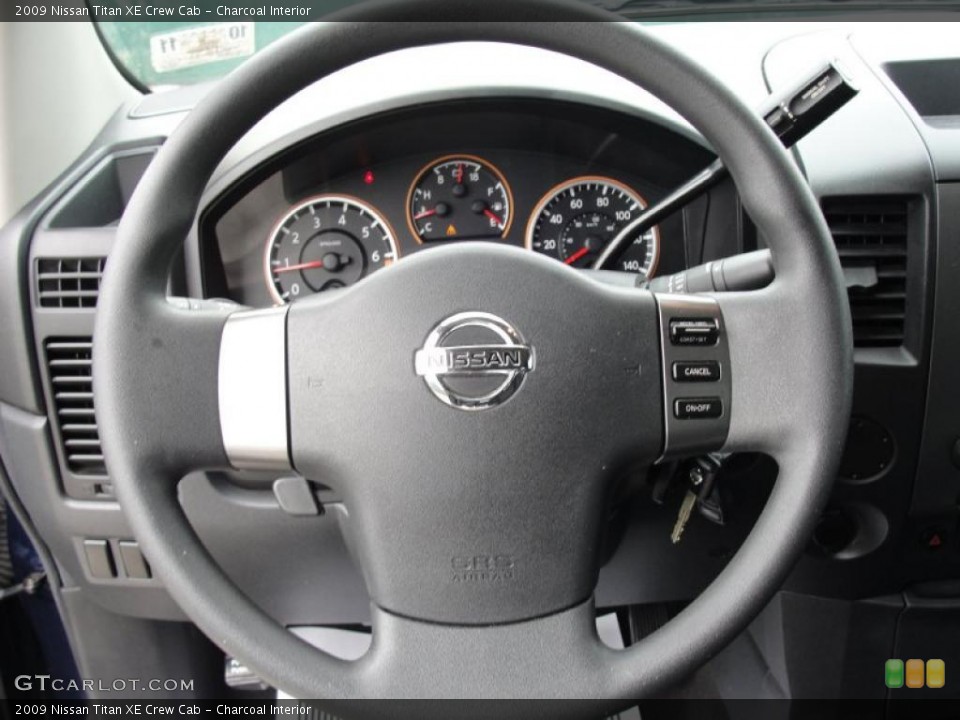 Charcoal Interior Steering Wheel for the 2009 Nissan Titan XE Crew Cab #45480893