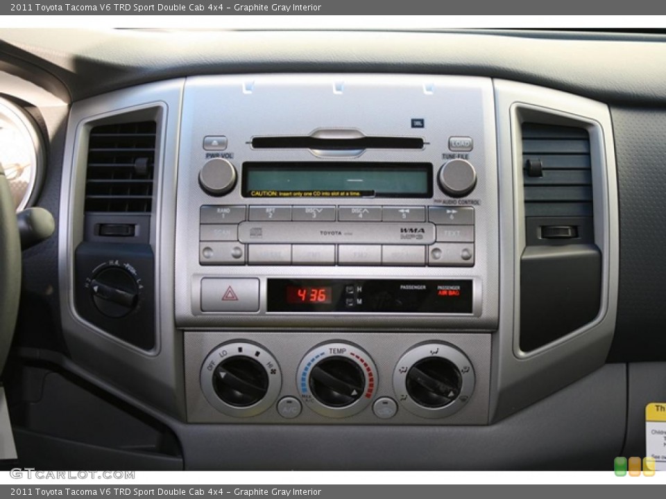 Graphite Gray Interior Controls for the 2011 Toyota Tacoma V6 TRD Sport Double Cab 4x4 #45511679