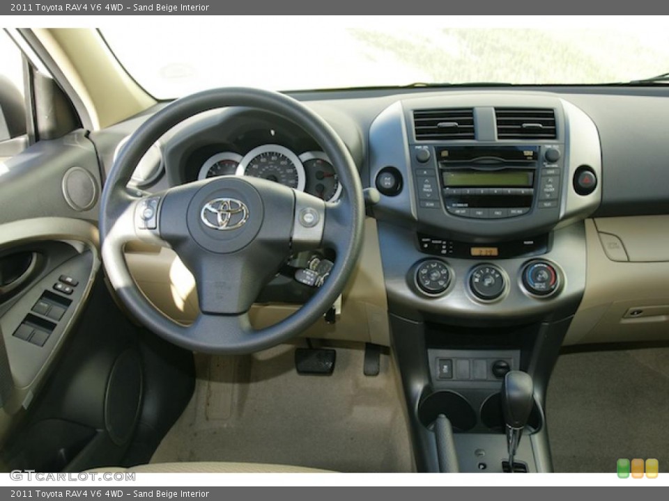 Sand Beige Interior Dashboard for the 2011 Toyota RAV4 V6 4WD #45512103