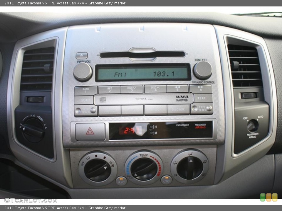Graphite Gray Interior Controls for the 2011 Toyota Tacoma V6 TRD Access Cab 4x4 #45514240