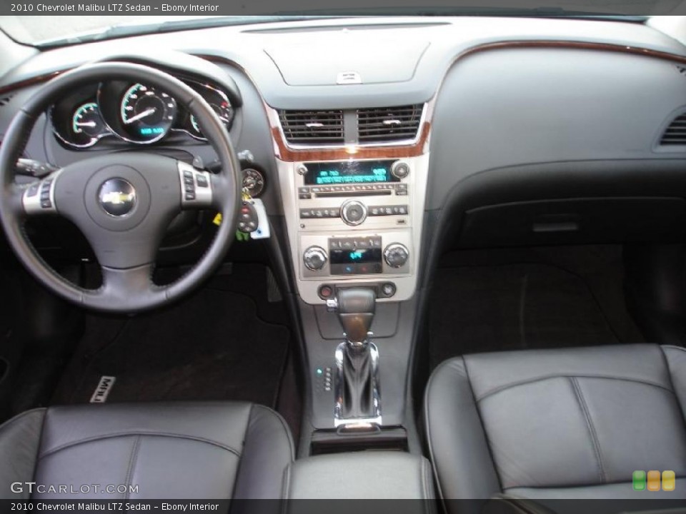 Ebony Interior Dashboard for the 2010 Chevrolet Malibu LTZ Sedan #45521424