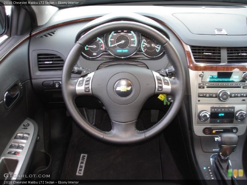 Ebony Interior Steering Wheel for the 2010 Chevrolet Malibu LTZ Sedan #45521572