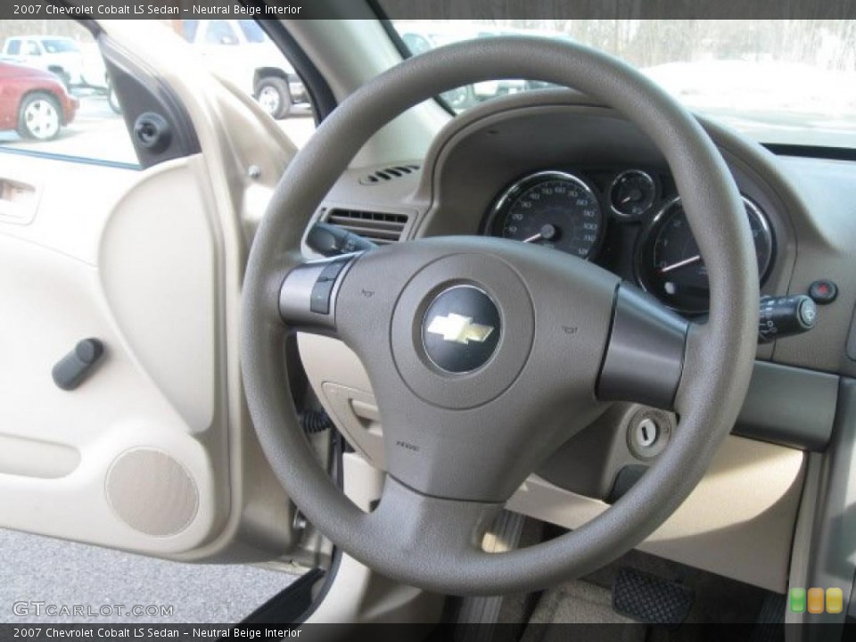 Neutral Beige Interior Steering Wheel for the 2007 Chevrolet Cobalt LS Sedan #45534221