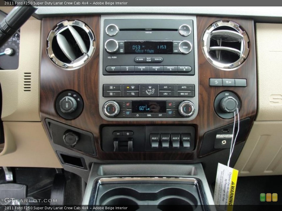 Adobe Beige Interior Controls for the 2011 Ford F250 Super Duty Lariat Crew Cab 4x4 #45536881