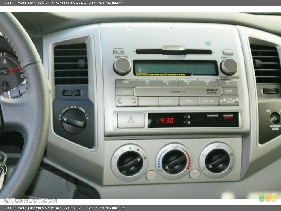 Graphite Gray Interior Controls for the 2011 Toyota Tacoma V6 SR5 Access Cab 4x4 #45574686