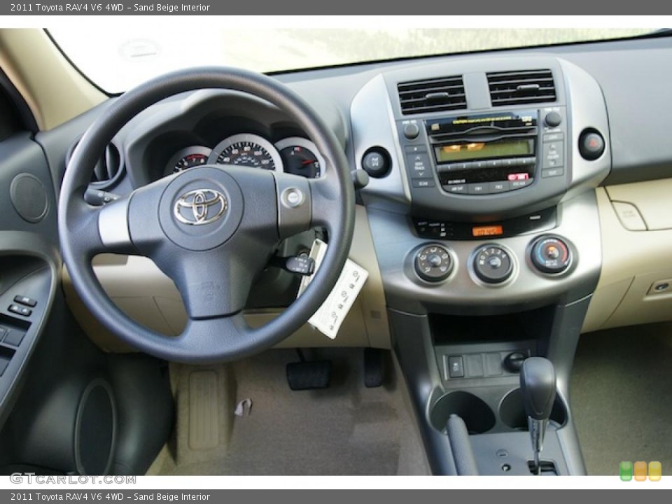Sand Beige Interior Dashboard for the 2011 Toyota RAV4 V6 4WD #45600349