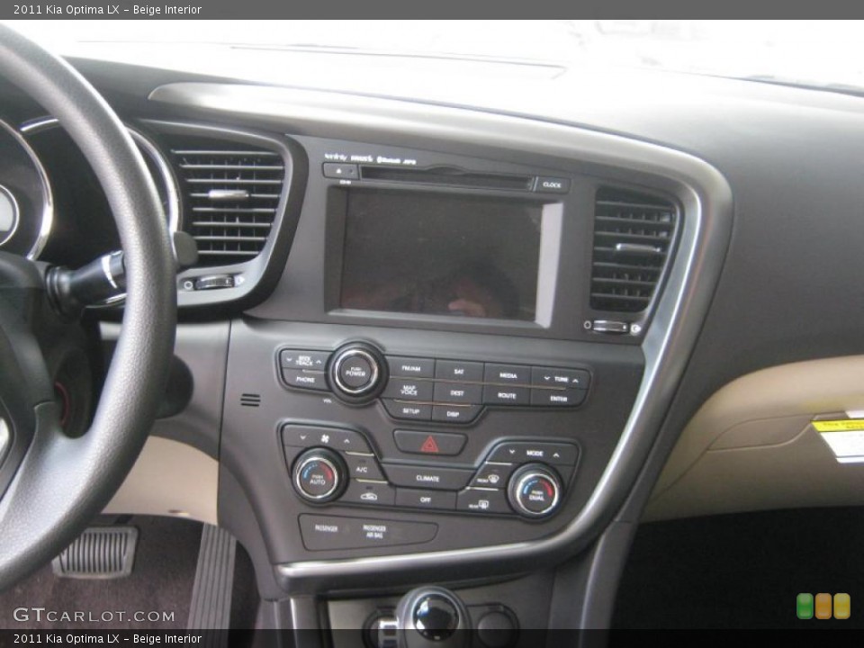 Beige Interior Controls for the 2011 Kia Optima LX #45607318