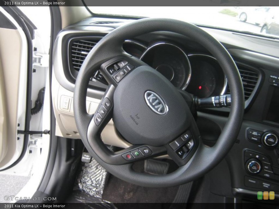 Beige Interior Steering Wheel for the 2011 Kia Optima LX #45607326