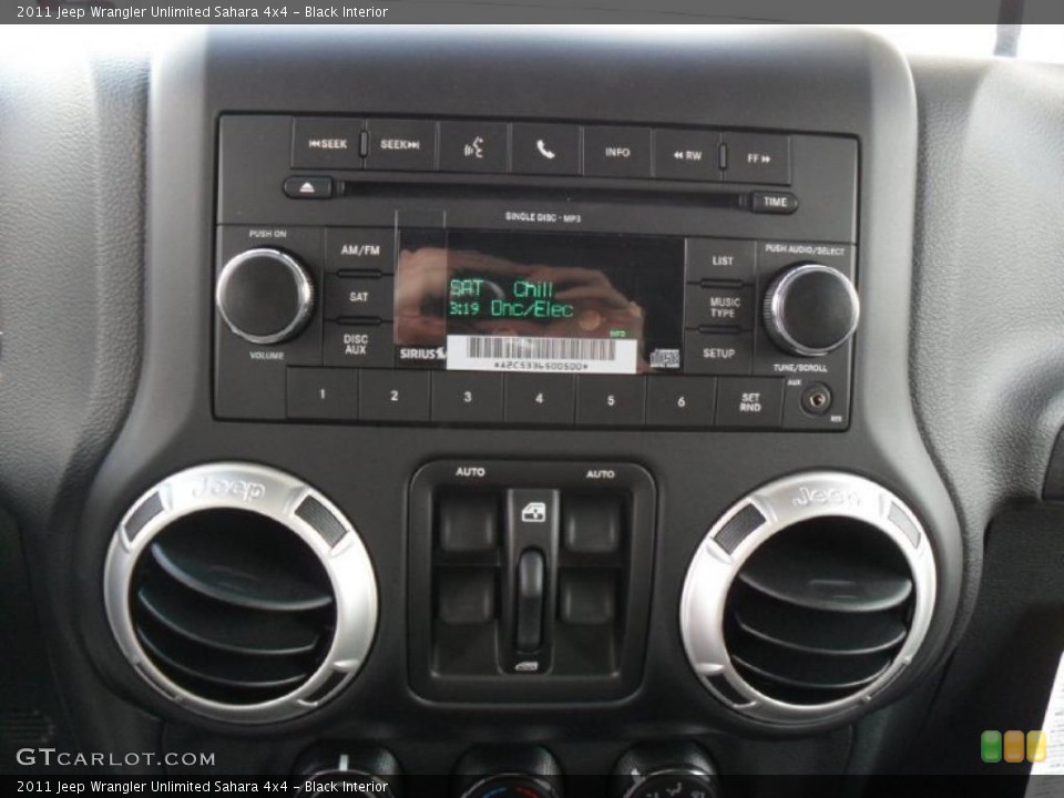 Black Interior Controls for the 2011 Jeep Wrangler Unlimited Sahara 4x4 #45614135