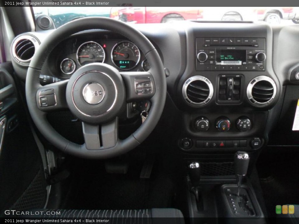 Black Interior Dashboard for the 2011 Jeep Wrangler Unlimited Sahara 4x4 #45614215