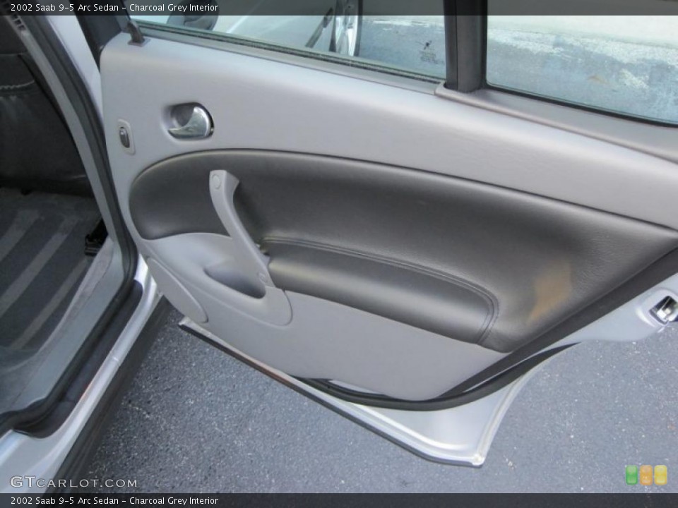 Charcoal Grey Interior Door Panel for the 2002 Saab 9-5 Arc Sedan #45627515