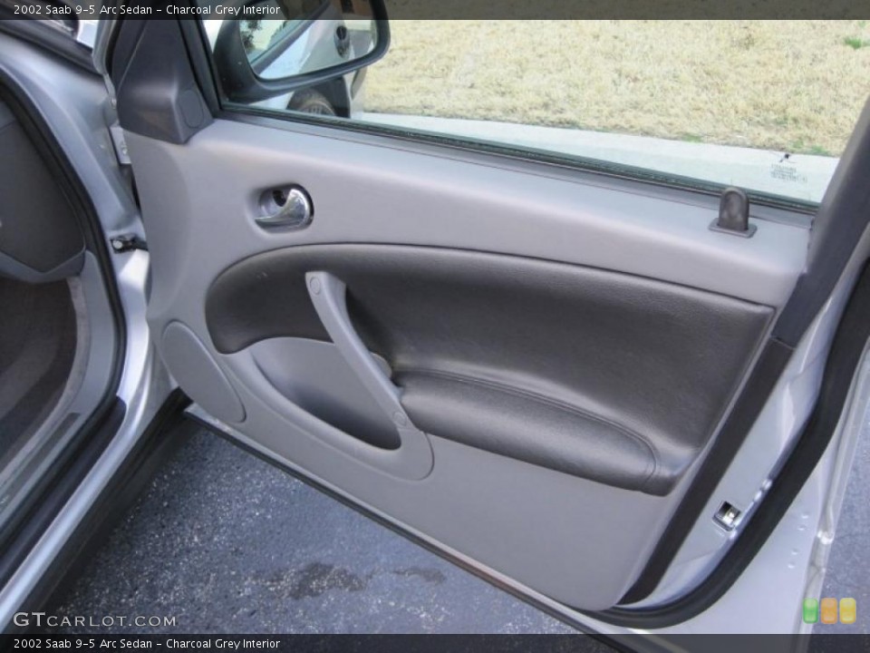 Charcoal Grey Interior Door Panel for the 2002 Saab 9-5 Arc Sedan #45627899