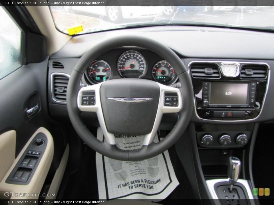 Black/Light Frost Beige Interior Steering Wheel for the 2011 Chrysler 200 Touring #45640074