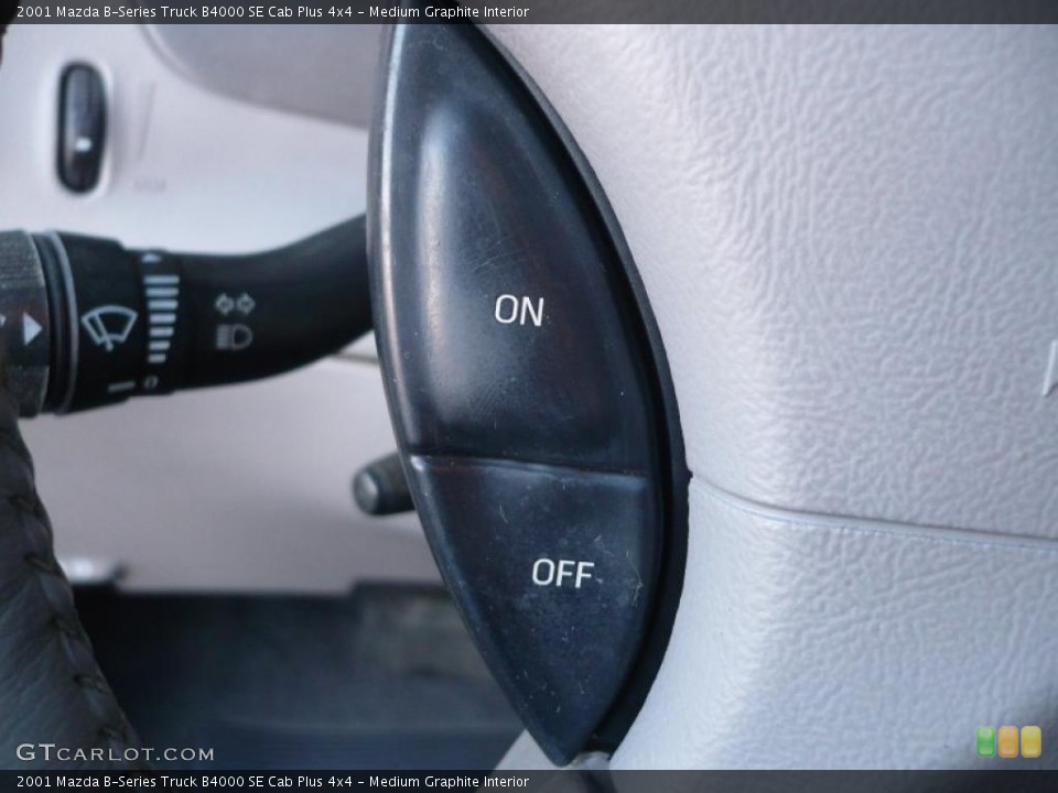 Medium Graphite Interior Controls for the 2001 Mazda B-Series Truck B4000 SE Cab Plus 4x4 #45642241