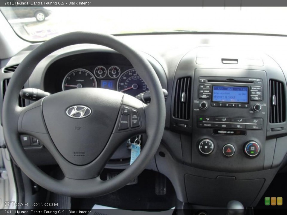 Black Interior Dashboard for the 2011 Hyundai Elantra Touring GLS #45650197