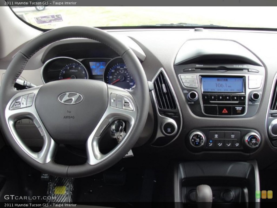 Taupe Interior Dashboard for the 2011 Hyundai Tucson GLS #45650583