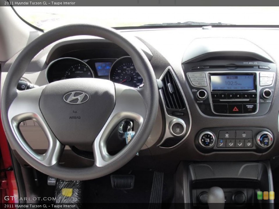 Taupe Interior Dashboard for the 2011 Hyundai Tucson GL #45651061