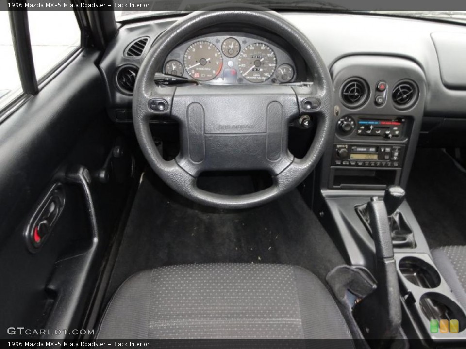 Black Interior Dashboard for the 1996 Mazda MX-5 Miata Roadster #45668272