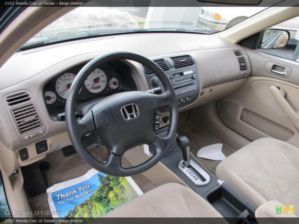 Beige Interior Prime Interior for the 2002 Honda Civic LX Sedan #45674232
