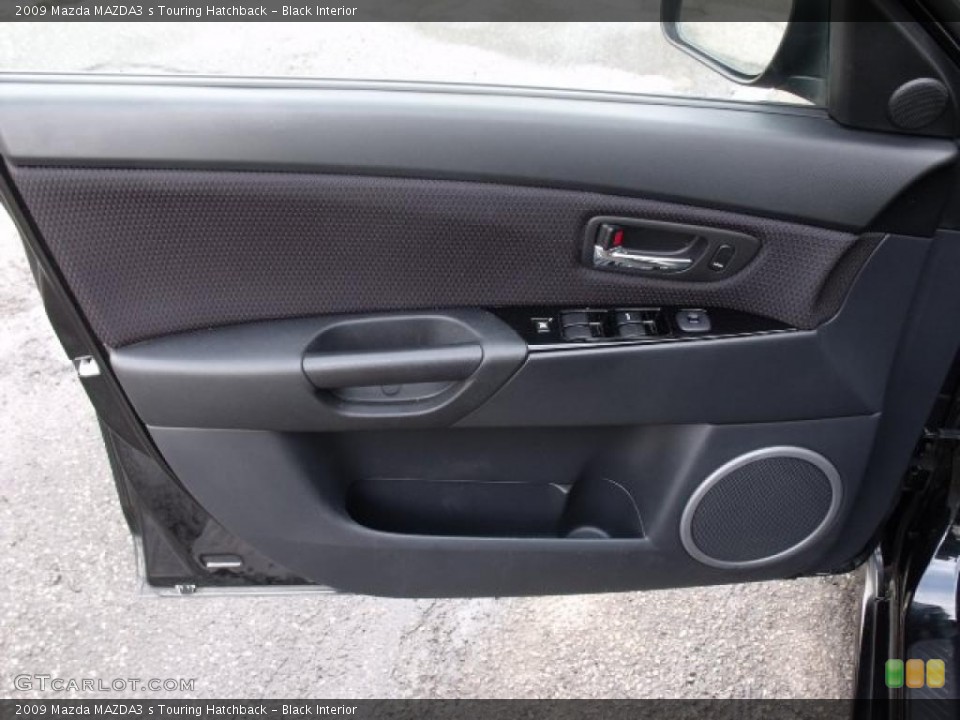 Black Interior Door Panel for the 2009 Mazda MAZDA3 s Touring Hatchback #45680202