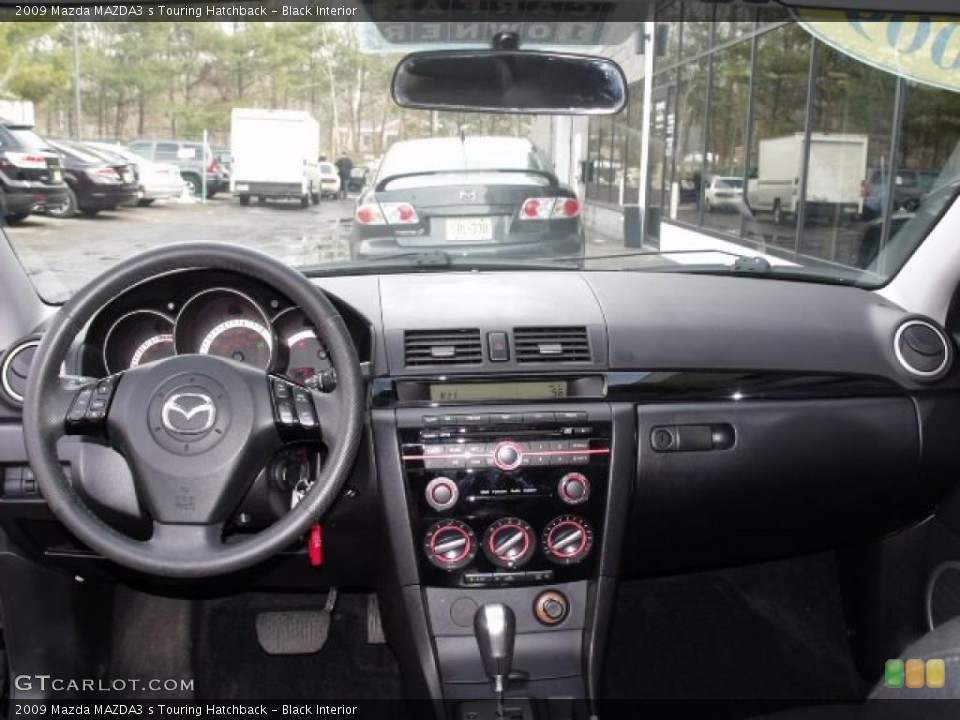 Black Interior Dashboard for the 2009 Mazda MAZDA3 s Touring Hatchback #45680230