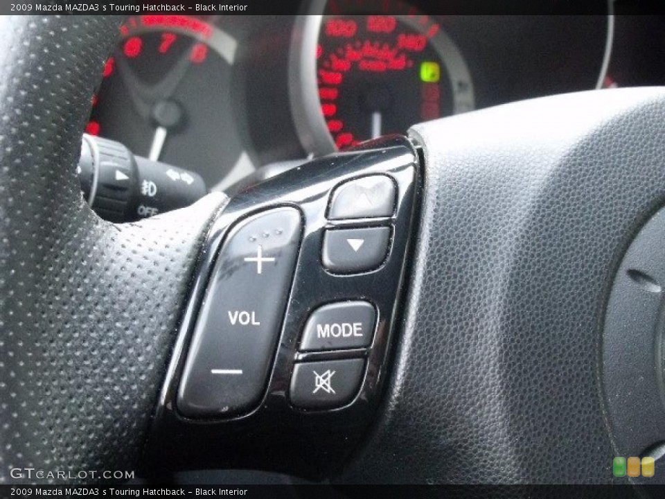 Black Interior Controls for the 2009 Mazda MAZDA3 s Touring Hatchback #45680238