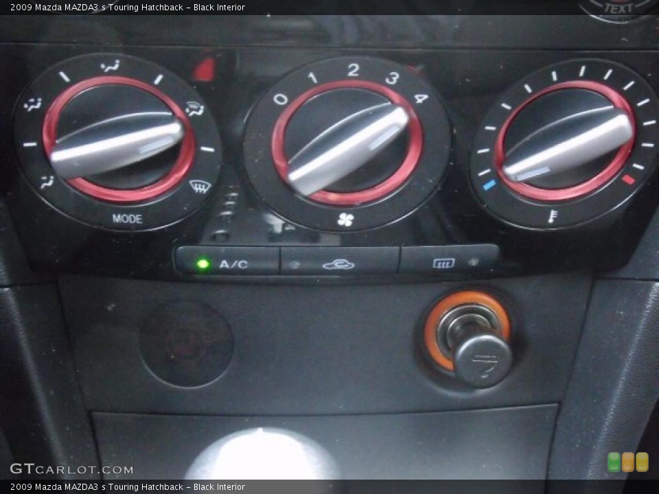 Black Interior Controls for the 2009 Mazda MAZDA3 s Touring Hatchback #45680278