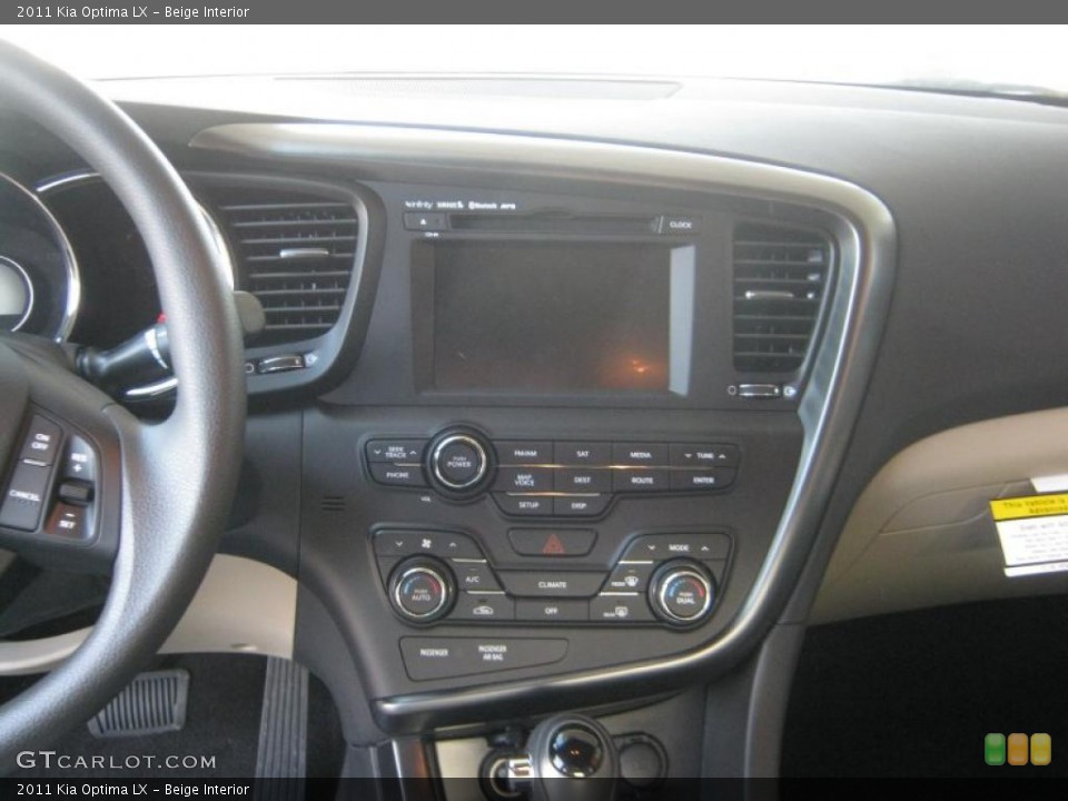Beige Interior Controls for the 2011 Kia Optima LX #45697097