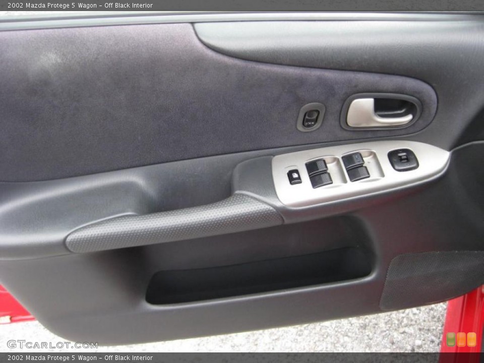 Off Black Interior Door Panel for the 2002 Mazda Protege 5 Wagon #45697557