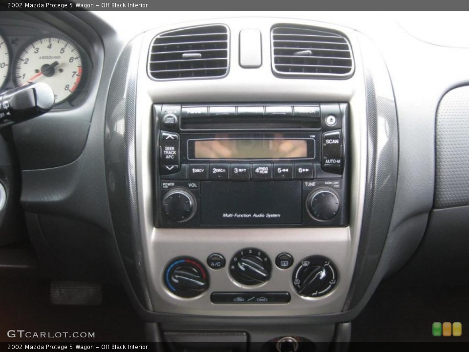 Off Black Interior Controls for the 2002 Mazda Protege 5 Wagon #45697605