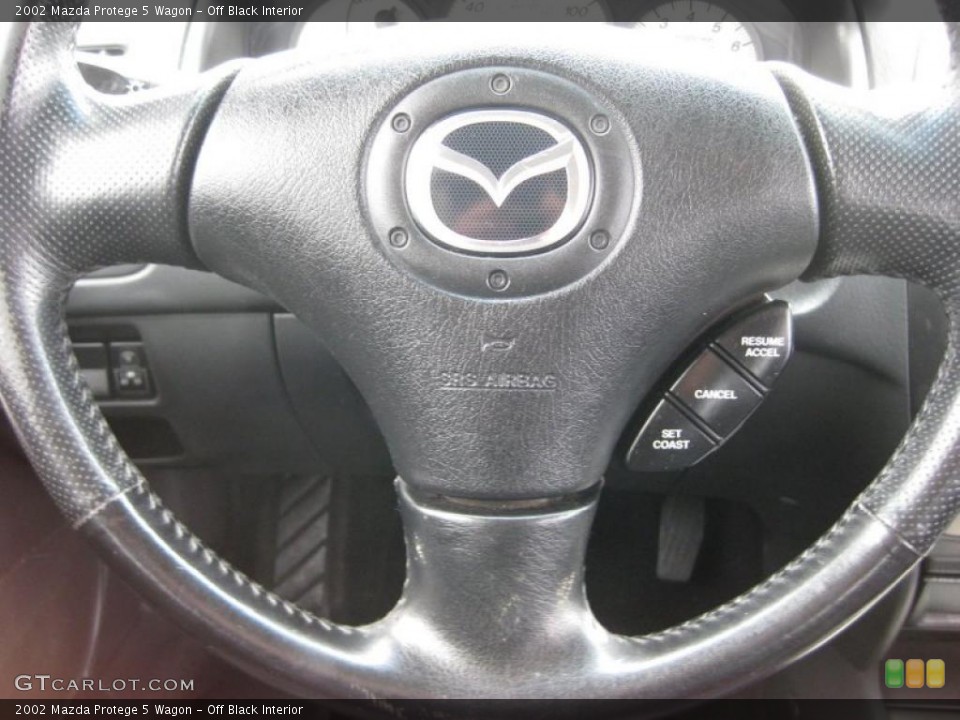 Off Black Interior Controls for the 2002 Mazda Protege 5 Wagon #45697613