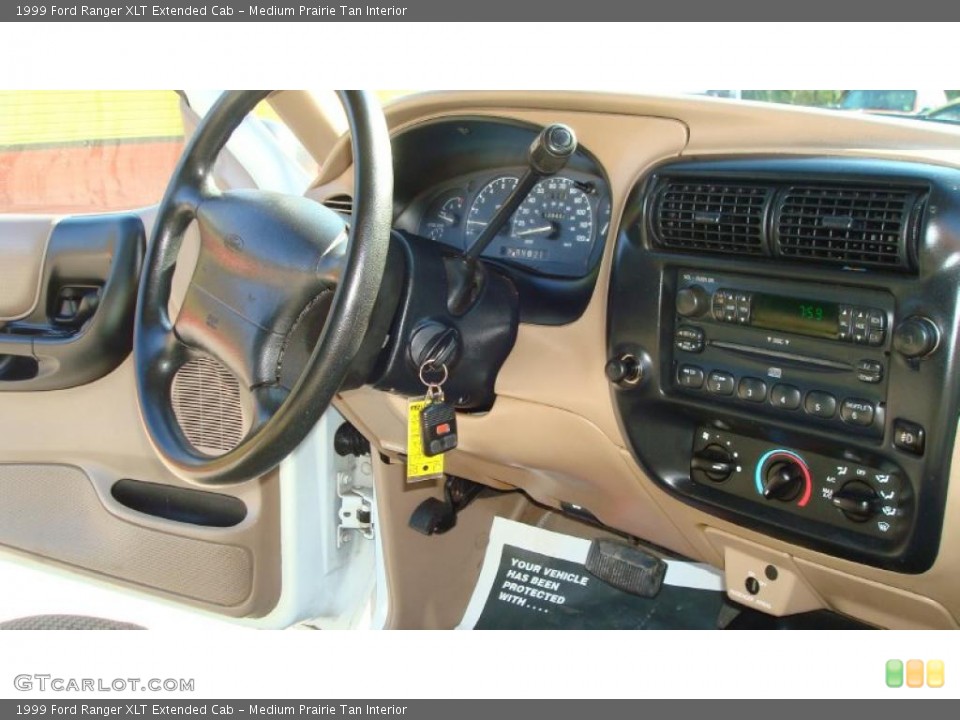 Medium Prairie Tan Interior Controls for the 1999 Ford Ranger XLT Extended Cab #45701897