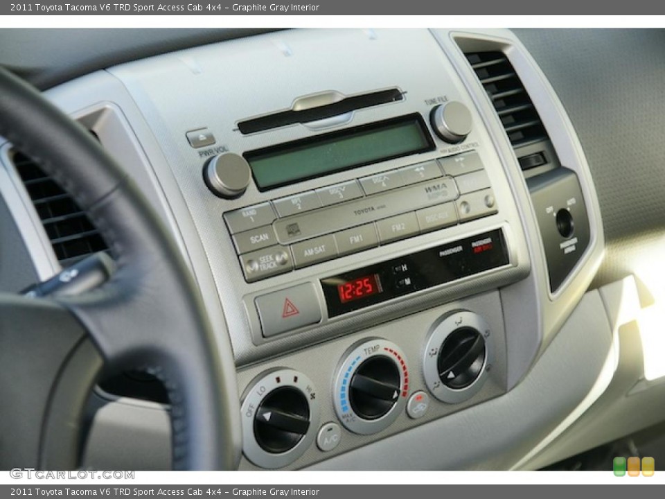 Graphite Gray Interior Controls for the 2011 Toyota Tacoma V6 TRD Sport Access Cab 4x4 #45702701