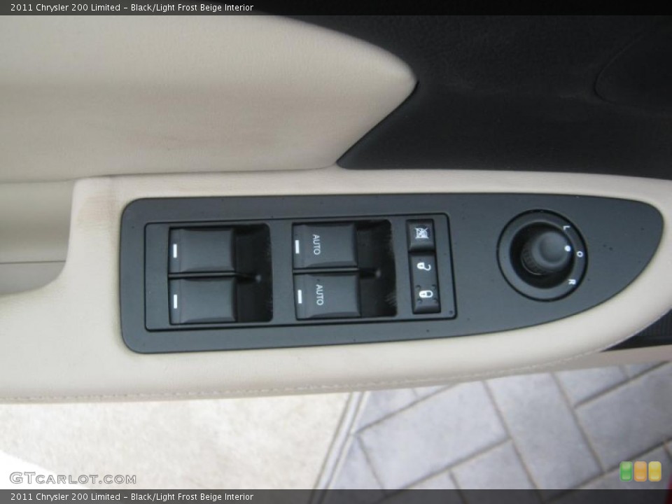 Black/Light Frost Beige Interior Controls for the 2011 Chrysler 200 Limited #45704398