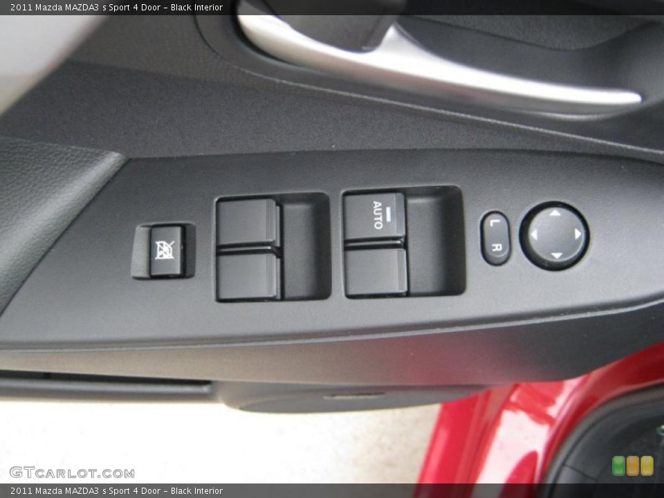 Black Interior Controls for the 2011 Mazda MAZDA3 s Sport 4 Door #45705322