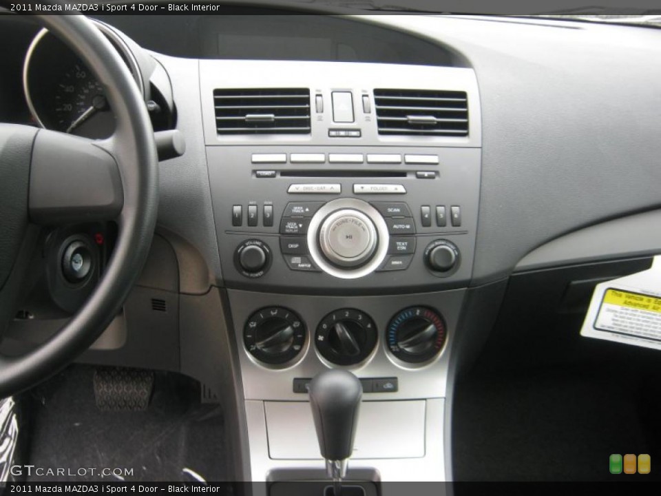 Black Interior Controls for the 2011 Mazda MAZDA3 i Sport 4 Door #45705994