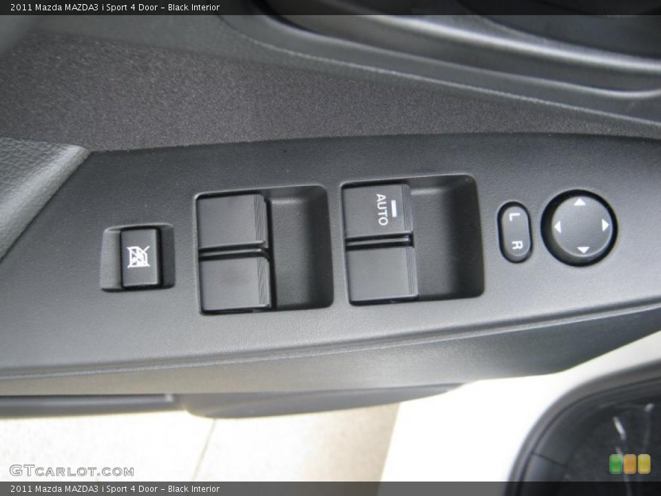 Black Interior Controls for the 2011 Mazda MAZDA3 i Sport 4 Door #45706878