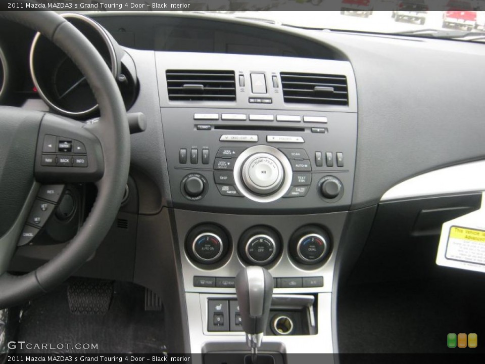 Black Interior Controls for the 2011 Mazda MAZDA3 s Grand Touring 4 Door #45707486