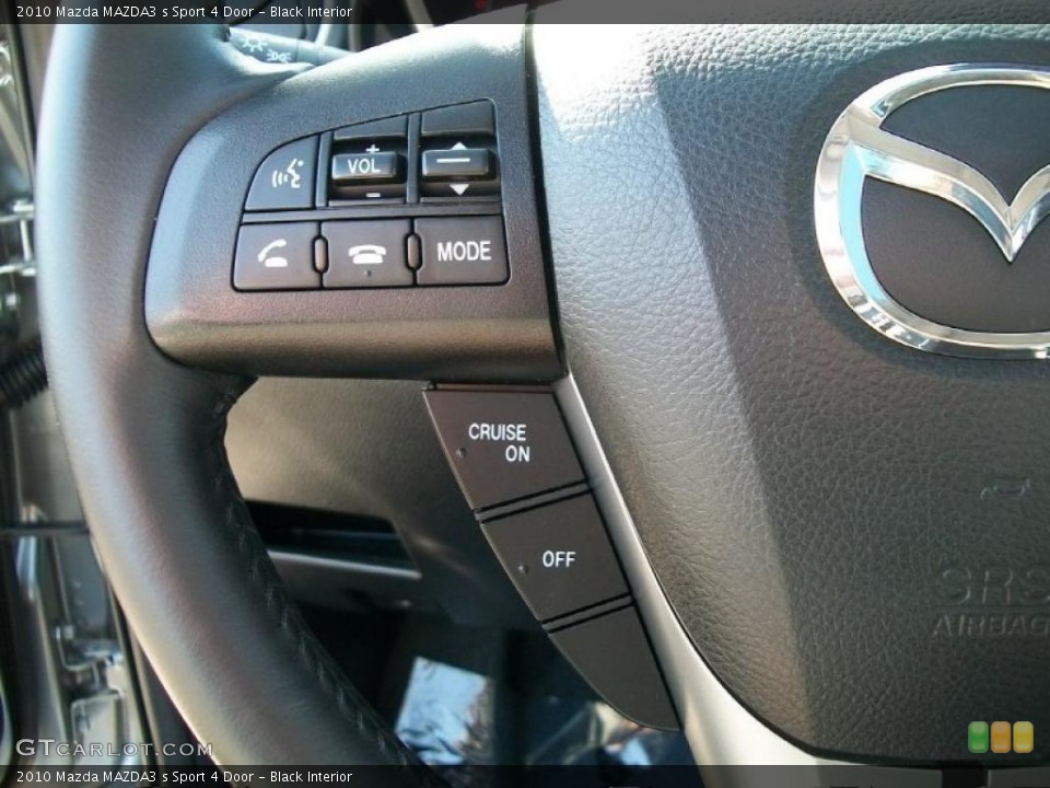 Black Interior Controls for the 2010 Mazda MAZDA3 s Sport 4 Door #45741342