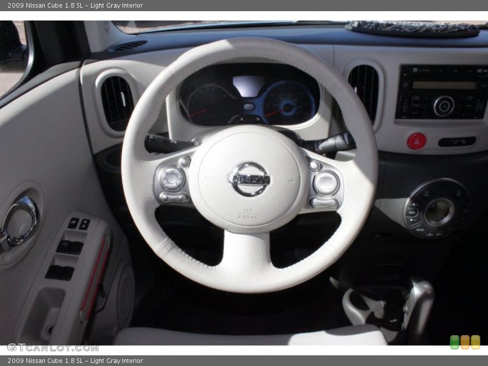 Light Gray Interior Steering Wheel for the 2009 Nissan Cube 1.8 SL #45742026