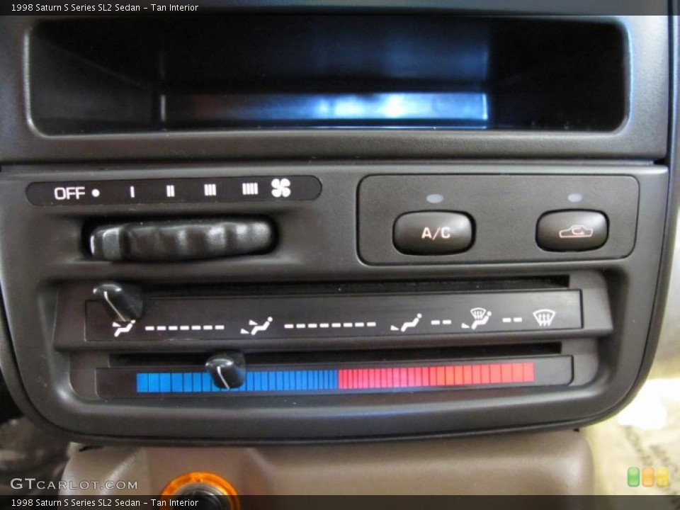 Tan Interior Controls for the 1998 Saturn S Series SL2 Sedan #45742910