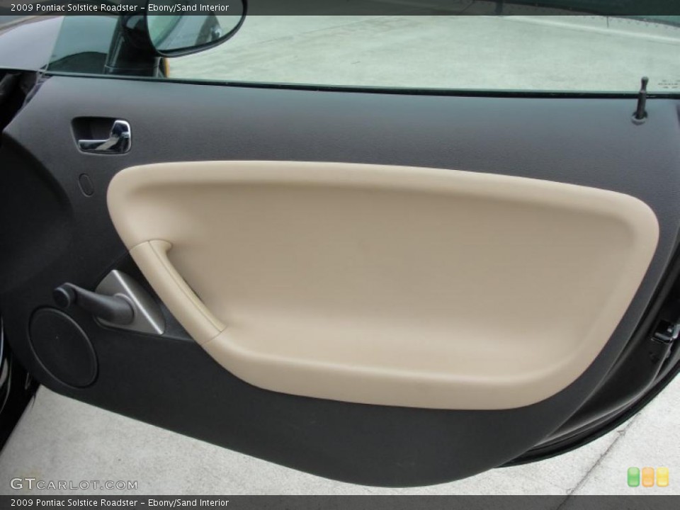 Ebony/Sand Interior Door Panel for the 2009 Pontiac Solstice Roadster #45745738
