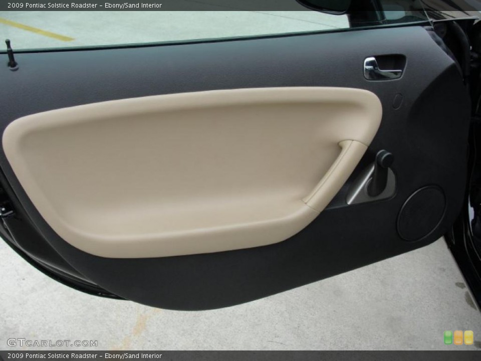 Ebony/Sand Interior Door Panel for the 2009 Pontiac Solstice Roadster #45745770