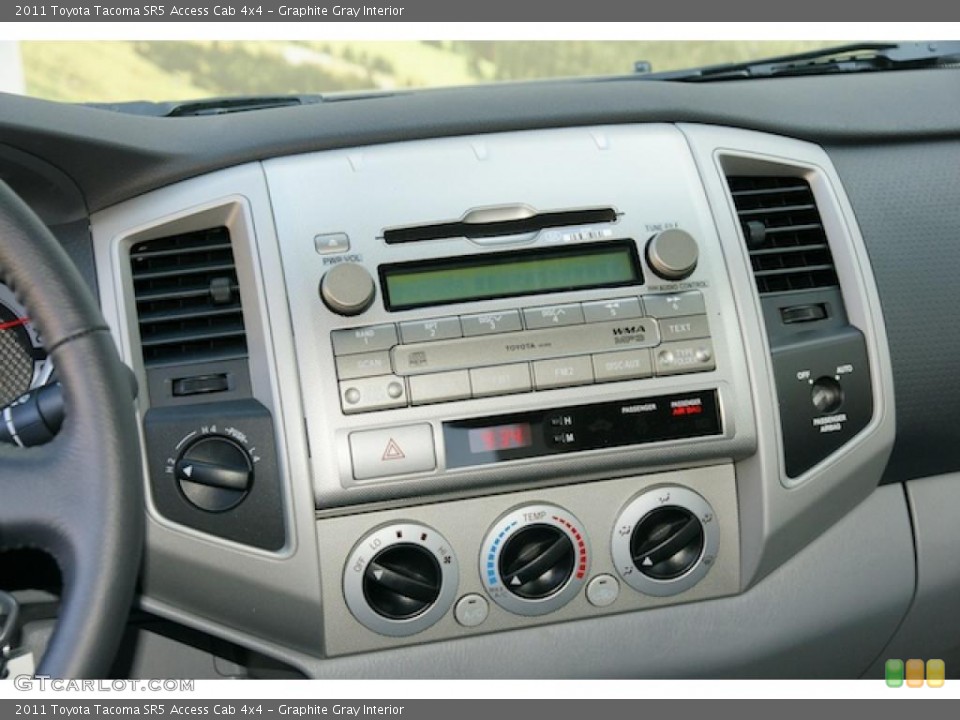 Graphite Gray Interior Controls for the 2011 Toyota Tacoma SR5 Access Cab 4x4 #45748146