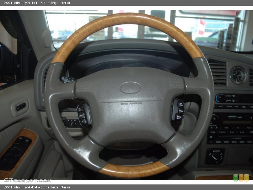 Stone Beige Interior Steering Wheel for the 2001 Infiniti QX4 4x4 #45763159