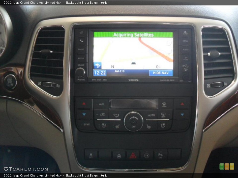 Black/Light Frost Beige Interior Controls for the 2011 Jeep Grand Cherokee Limited 4x4 #45784034