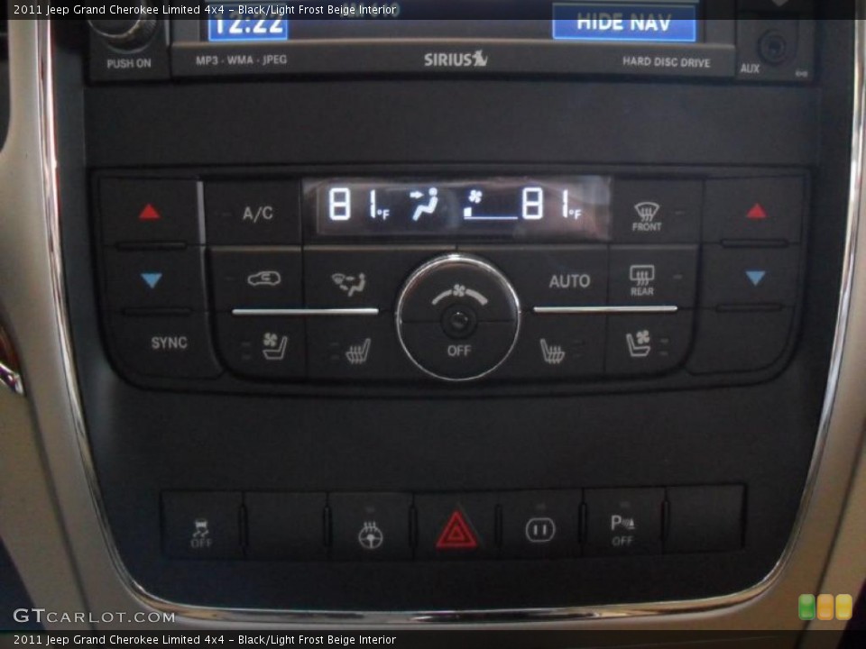 Black/Light Frost Beige Interior Controls for the 2011 Jeep Grand Cherokee Limited 4x4 #45784042