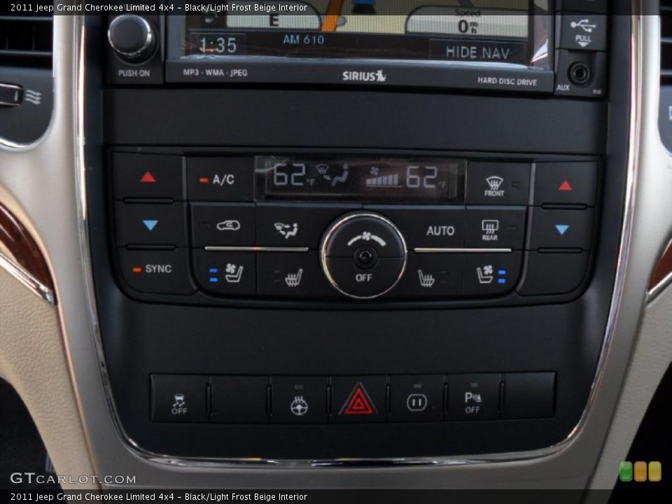 Black/Light Frost Beige Interior Controls for the 2011 Jeep Grand Cherokee Limited 4x4 #45784442